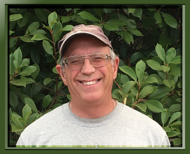 Dan Negus, Board member, male, wearing glasses and ball cap hat, person, human, and smiling face