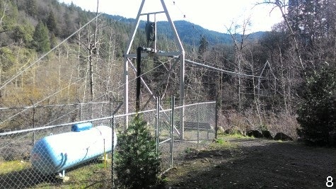 Tauhindauli Park sewer lift station over Sacramento River. Pipe suspended on cable.