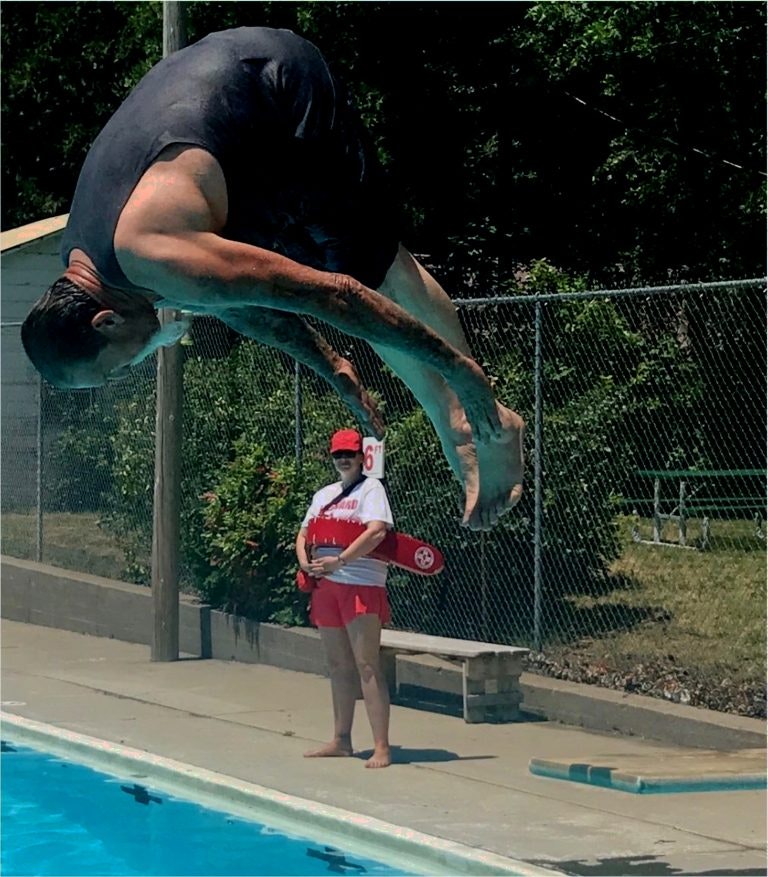 Councilman Big Dave doing a fancy first dive from board into pool for opening day 2019