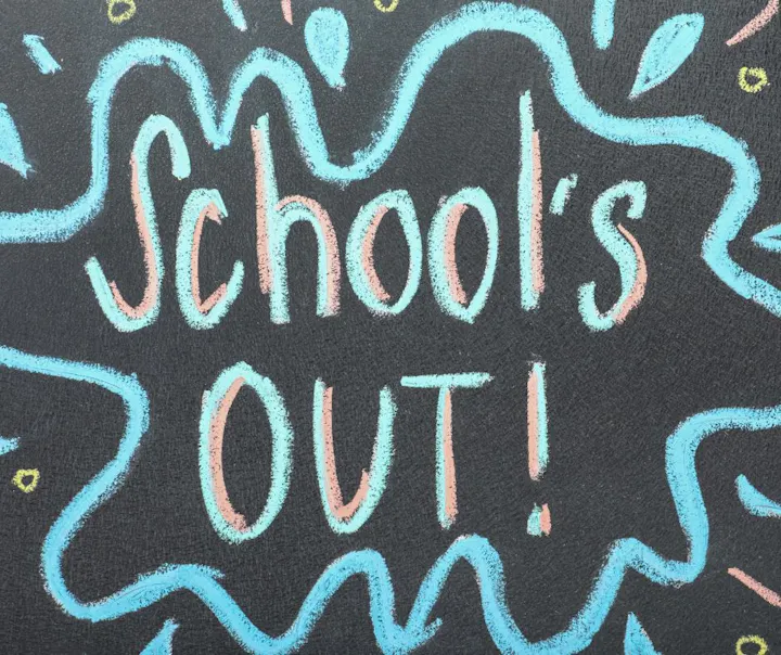 The image features a colorful chalkboard illustration with the words "School's OUT!" highlighted.