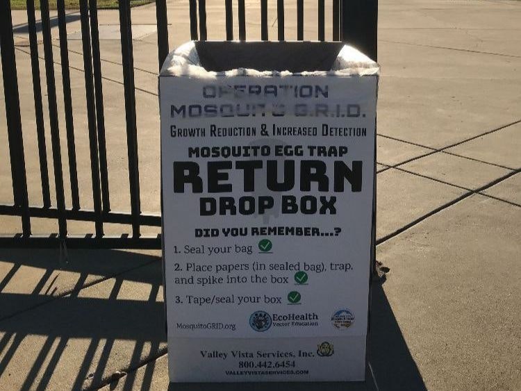 a return dropbox by a fence