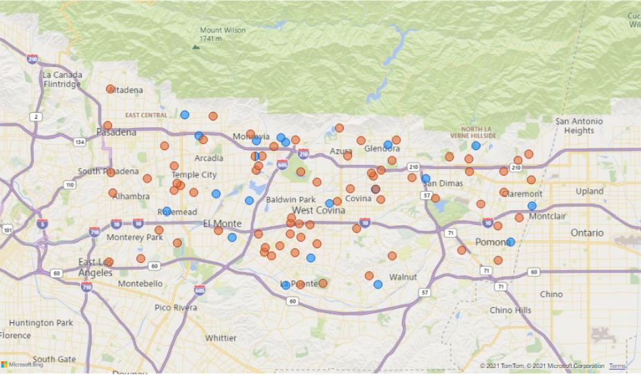 The image is a map showing locations marked by blue and orange dots around the West Covina area, likely indicating different data points.