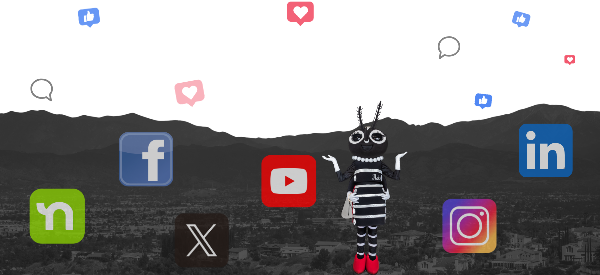 A cartoon character dressed uniquely stands in front of mountains, with various social media icons floating around.