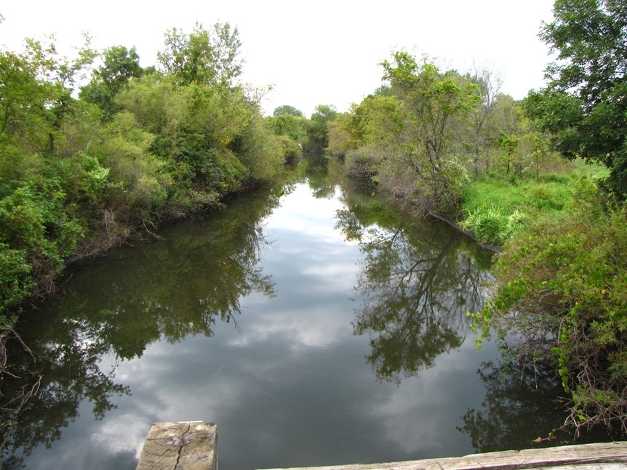 May contain: canal, outdoors, water, land, nature, pond, plant, and vegetation