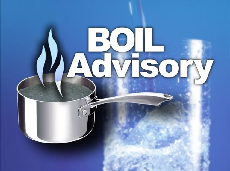 Image shows "Boil Advisory" text with a boiling pot and water splashing.