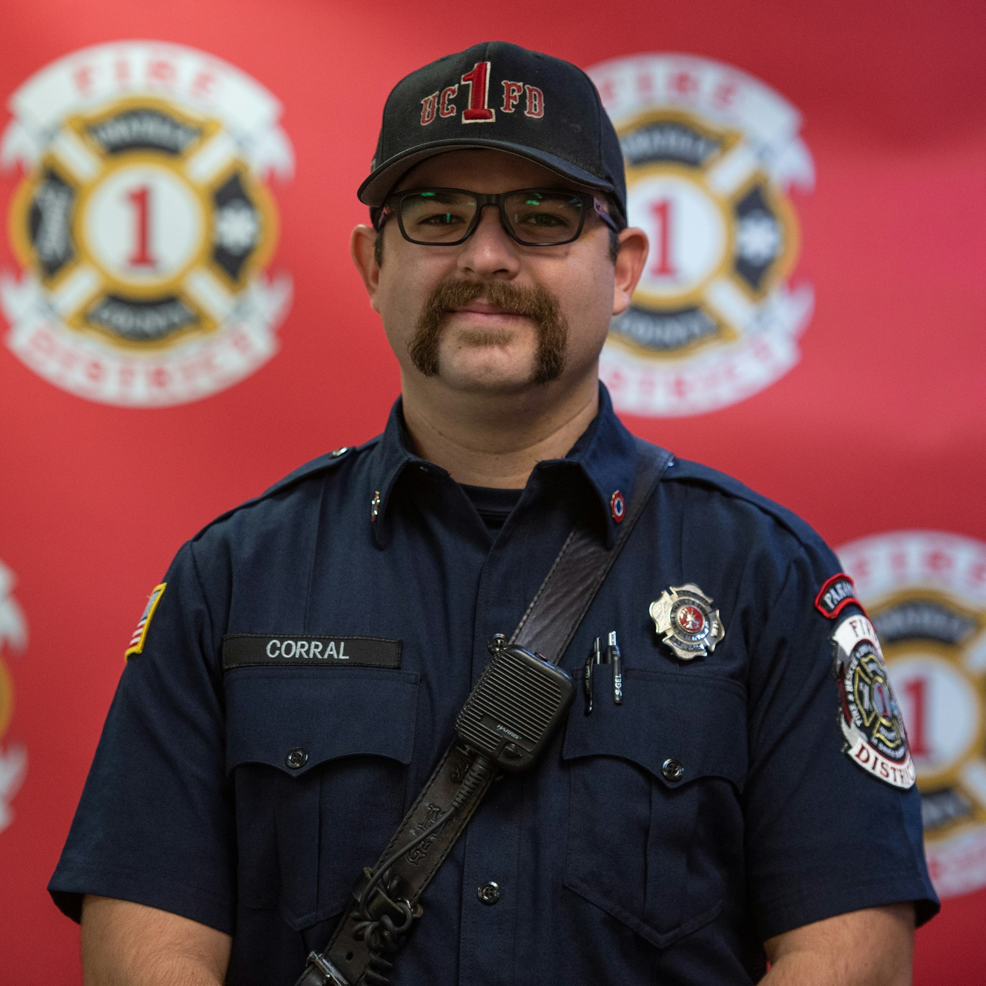 May contain: adult, male, man, person, officer, police officer, accessories, glasses, clothing, hat, and captain
