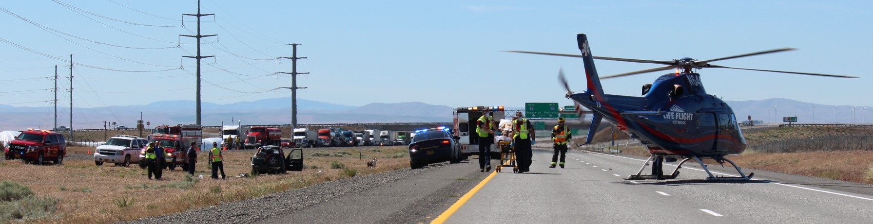 May contain: road, aircraft, helicopter, transportation, vehicle, person, car, and helmet