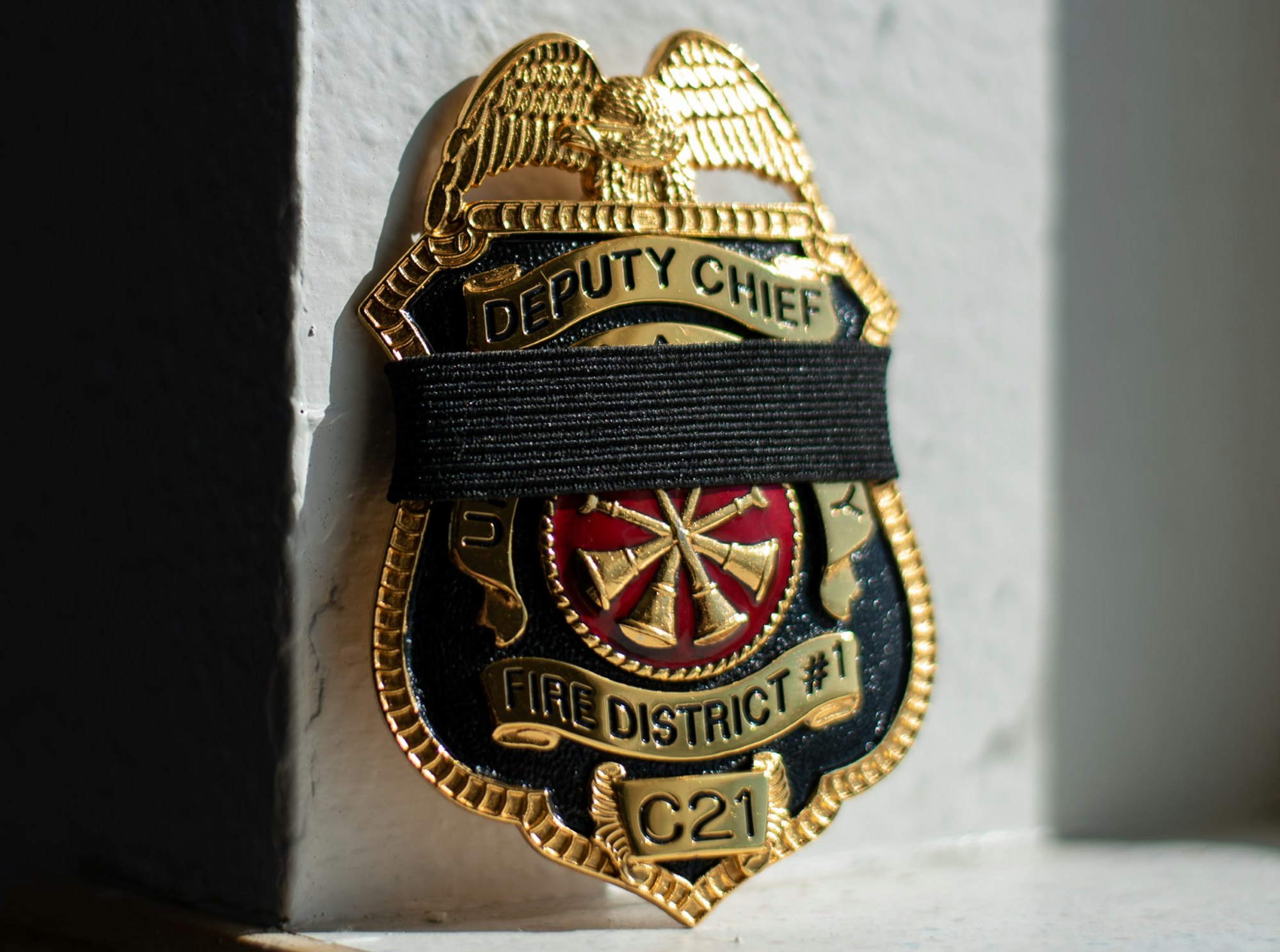 May contain: badge, logo, and symbol