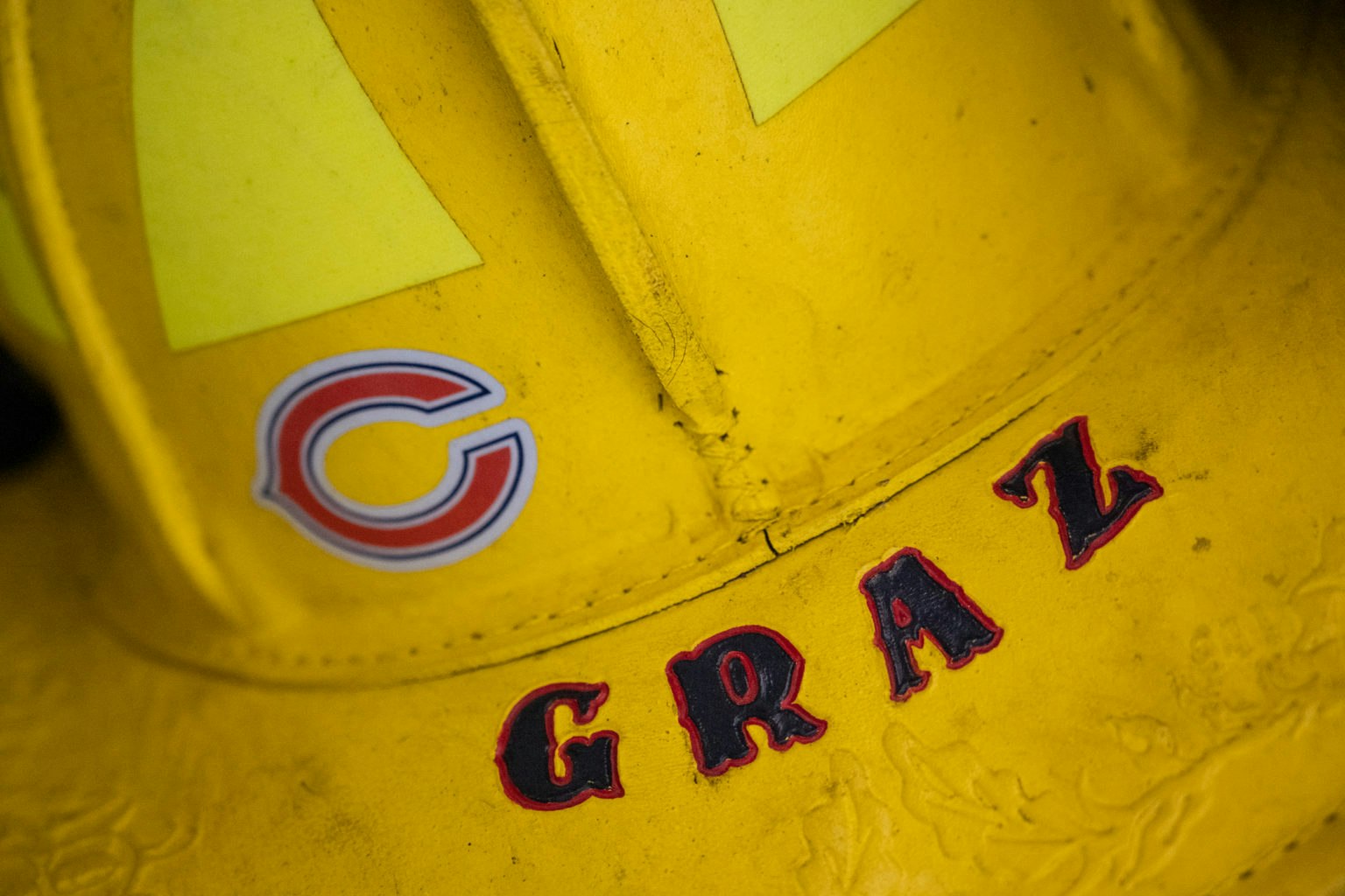May contain: helmet, clothing, hardhat, and logo