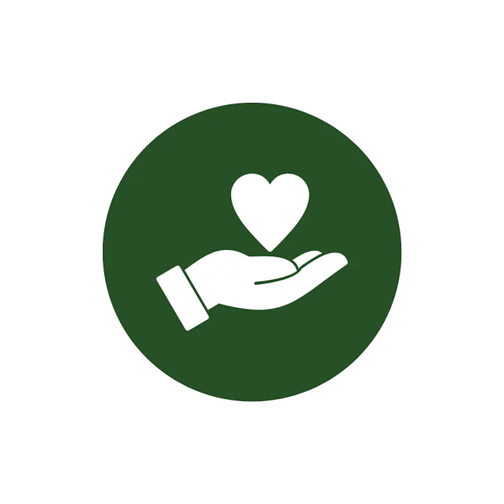 Icon of a hand holding a heart, symbolizing care or charity, within a green circle.
