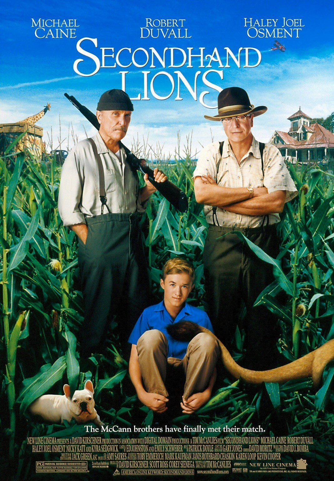 Three people pose in front of a cornfield with a house and giraffe in the background. Movie title: "Secondhand Lions."