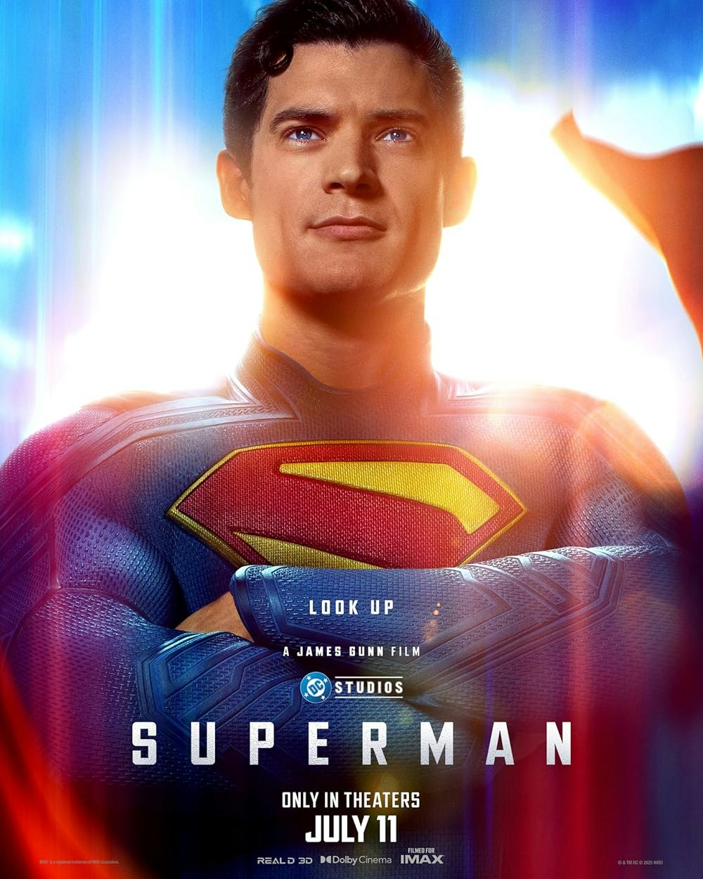Superman movie poster with a man in the Superman suit, titled "SUPERMAN," directed by James Gunn, in theaters July 11.