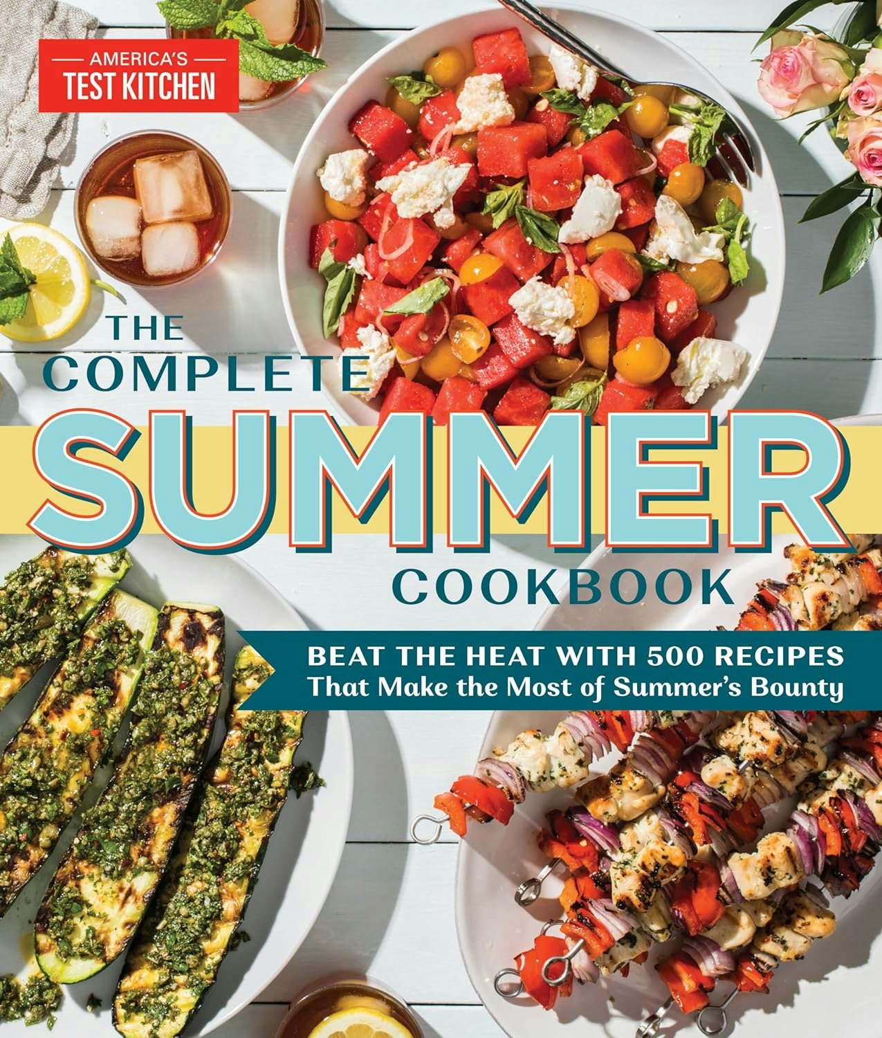 A cookbook cover featuring summer recipes with images of fresh salads, grilled vegetables, and skewers.