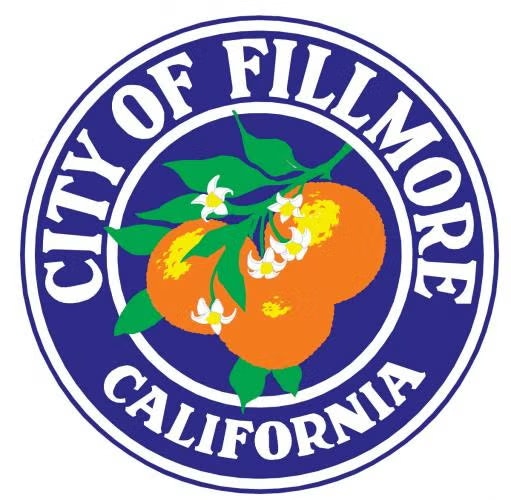 Official seal of the City of Fillmore, California, featuring oranges and blossoms on a blue circular background.