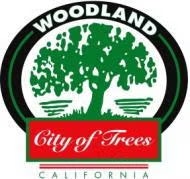 Logo with a tree, "Woodland" at the top, "City of Trees" on a red banner, and "California" at the bottom.