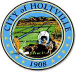 The image features the seal of Holtville, depicting agriculture, a wagon, and mountains, established in 1908.