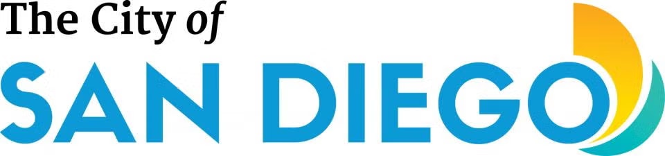 The image is a logo with the text "The City of San Diego" and colorful stylized sun and wave graphics.
