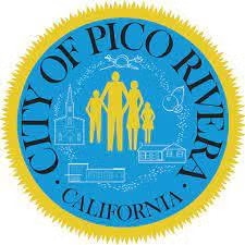 Seal of the City of Pico Rivera, California, featuring a family, buildings, and community symbols in blue and yellow.