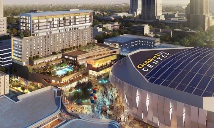 Aerial view of an urban landscape featuring a stadium labeled "Golden 1 Center" and surrounding buildings.