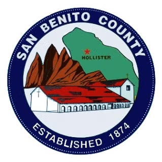 Seal of San Benito County featuring a mission building, mountains, and map pinpointing Hollister; established in 1874.