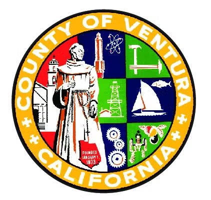 Seal of Ventura County, California with historical and geographical symbols, including a mission, rocket, gears, sailboat, and crops.