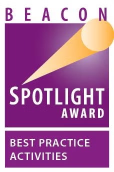 Purple "Beacon Spotlight Award" logo for "Best Practice Activities" with a light beam design.