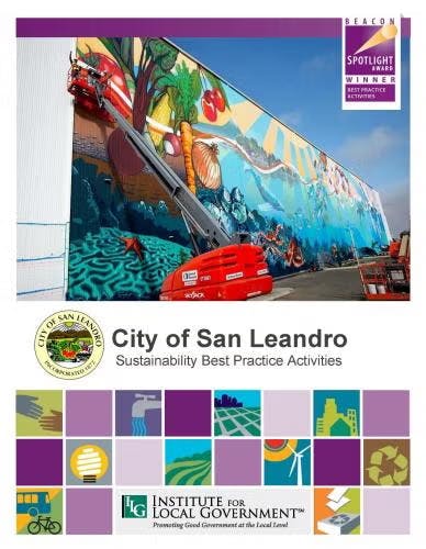 Colorful mural with a lift, "City of San Leandro" text, and logos for sustainability activities.