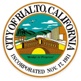 Seal of Rialto, California with a bridge, plane, and "Bridge to Progress" motto, incorporated on November 17, 1911.