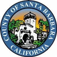 Seal of Santa Barbara County, California, featuring a mission-style building and trees.
