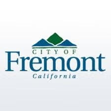 Logo of Fremont, California, with green hills graphic and text "City of Fremont, California."