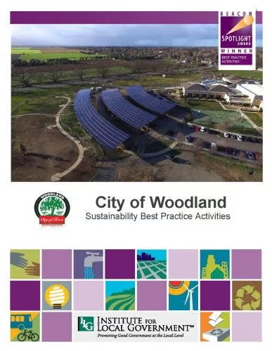 Aerial view of solar panels; City of Woodland's sustainability award; Institute for Local Government logo.