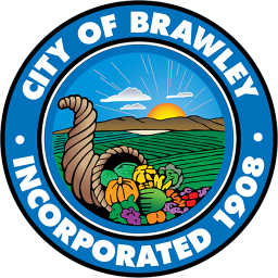 The image shows the seal of Brawley, featuring a cornucopia with fruits and vegetables, symbolizing agriculture and community.