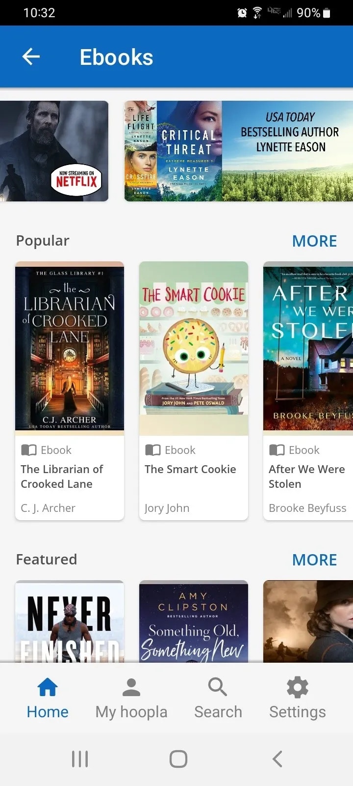 Ebook library interface showing popular and featured titles, including "The Librarian of Crooked Lane" and "The Smart Cookie."