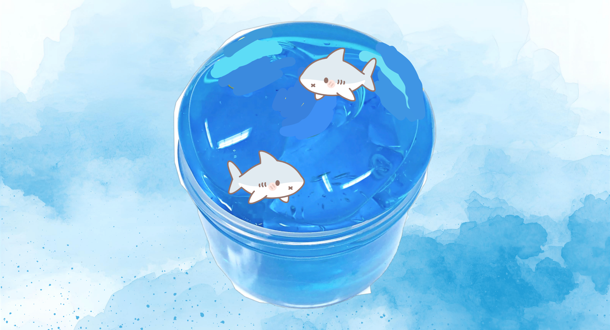A clear container filled with blue jelly featuring cartoon sharks on top, set against a light blue background.