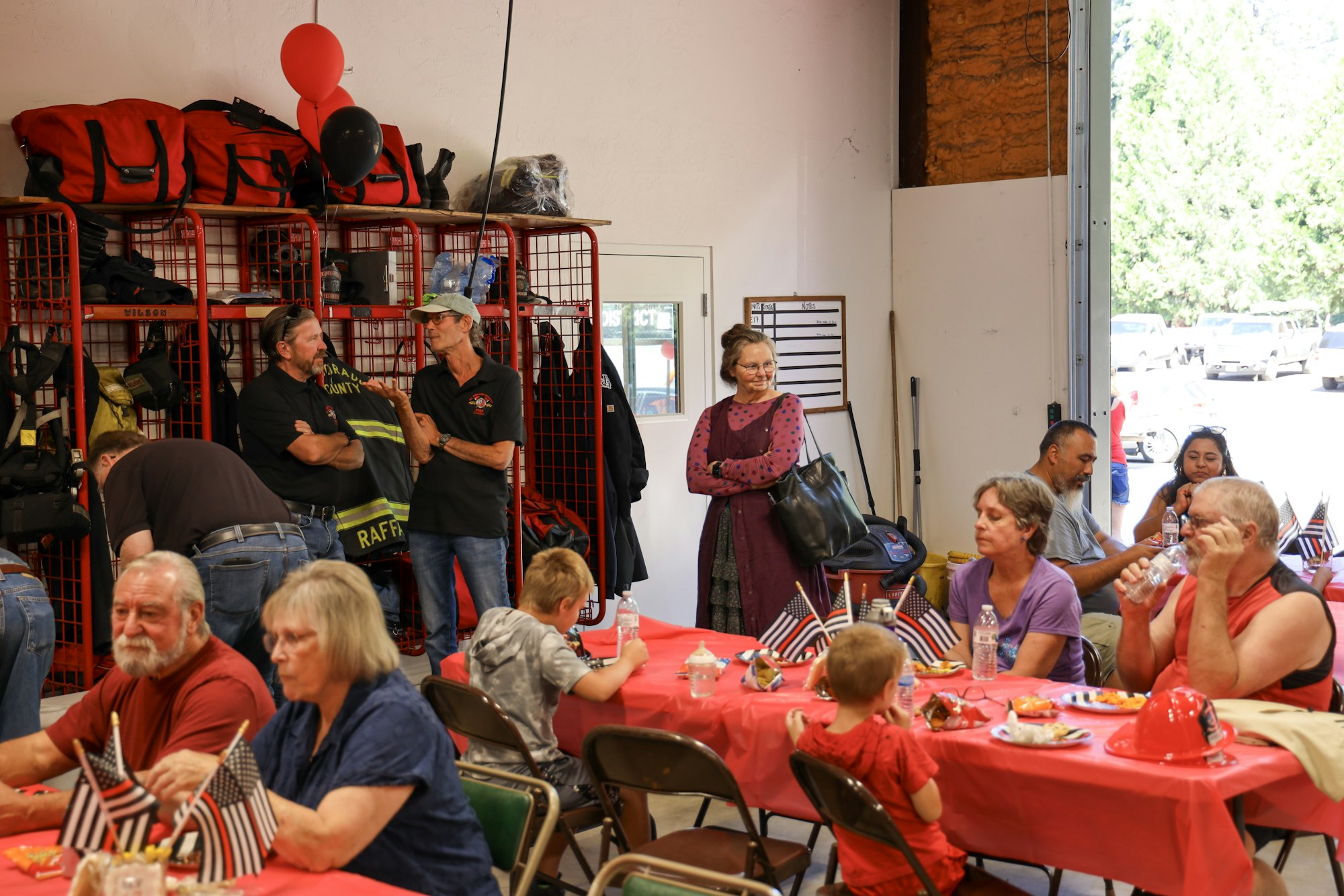 May contain: indoors, restaurant, cafeteria, food, food court, adult, female, person, woman, clothing, hat, accessories, bag, handbag, male, man, helmet, boy, child, glasses, wristwatch, chair, furniture, plate, car, transportation, vehicle, balloon, jeans, pants, and belt