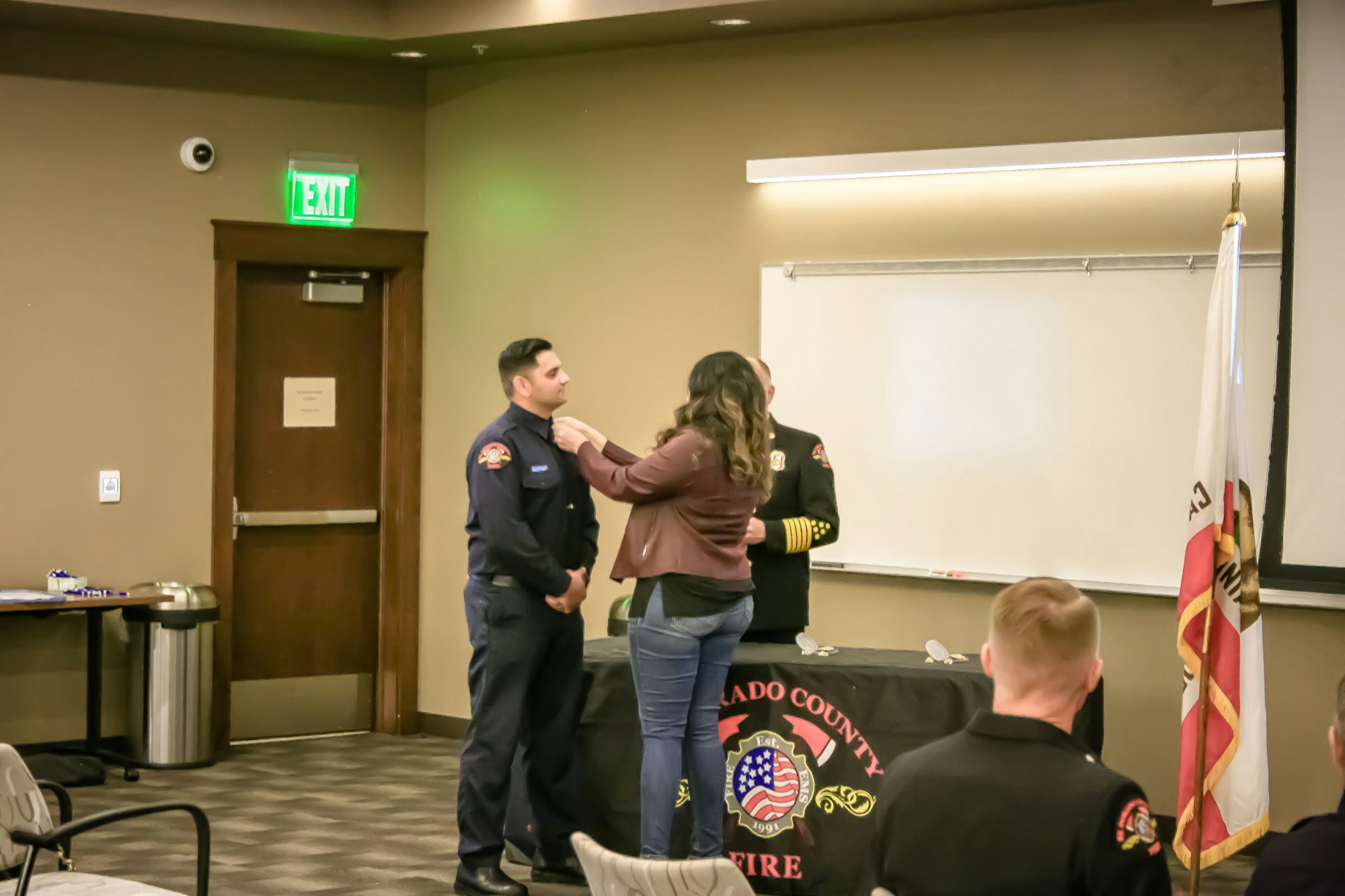 May contain: person, human, jeans, clothing, pants, denim, apparel, screen, electronics, and projection screen