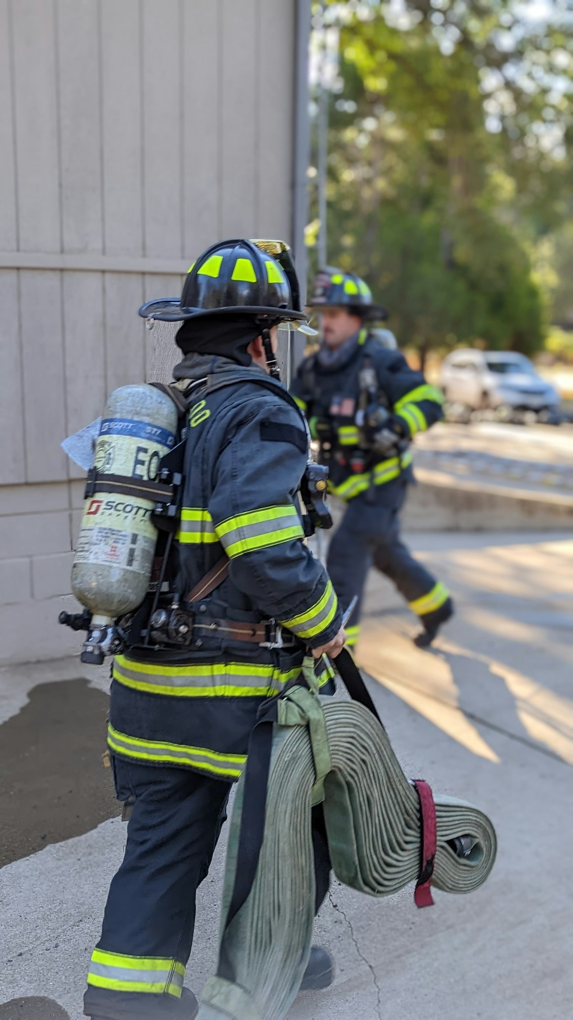 May contain: helmet, clothing, apparel, person, human, and fireman