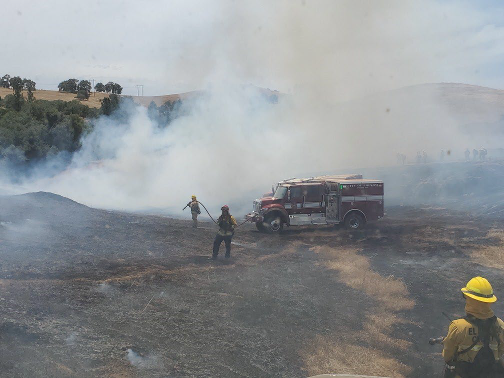May contain: person, human, smoke, truck, transportation, and vehicle