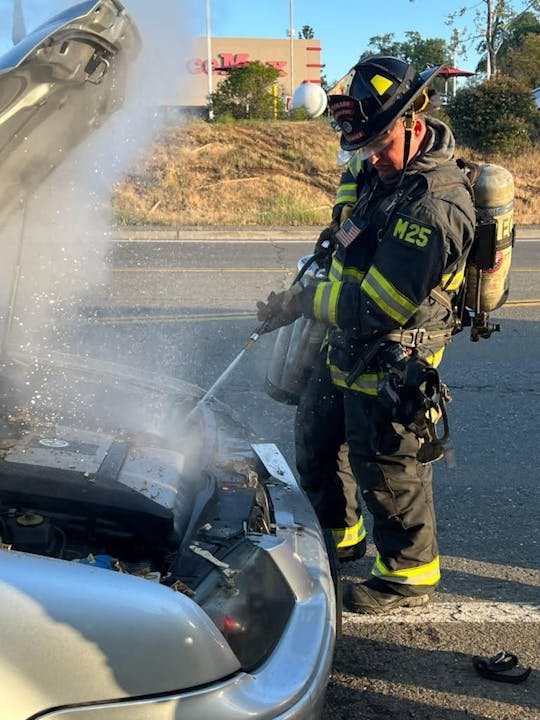 May contain: person, human, helmet, clothing, apparel, fireman, shoe, and footwear