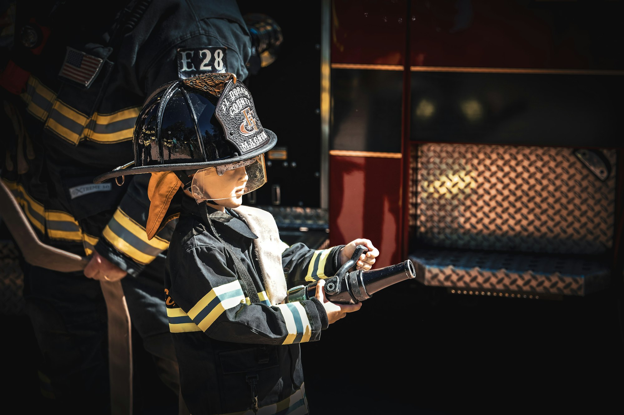 May contain: helmet, fireman, and person