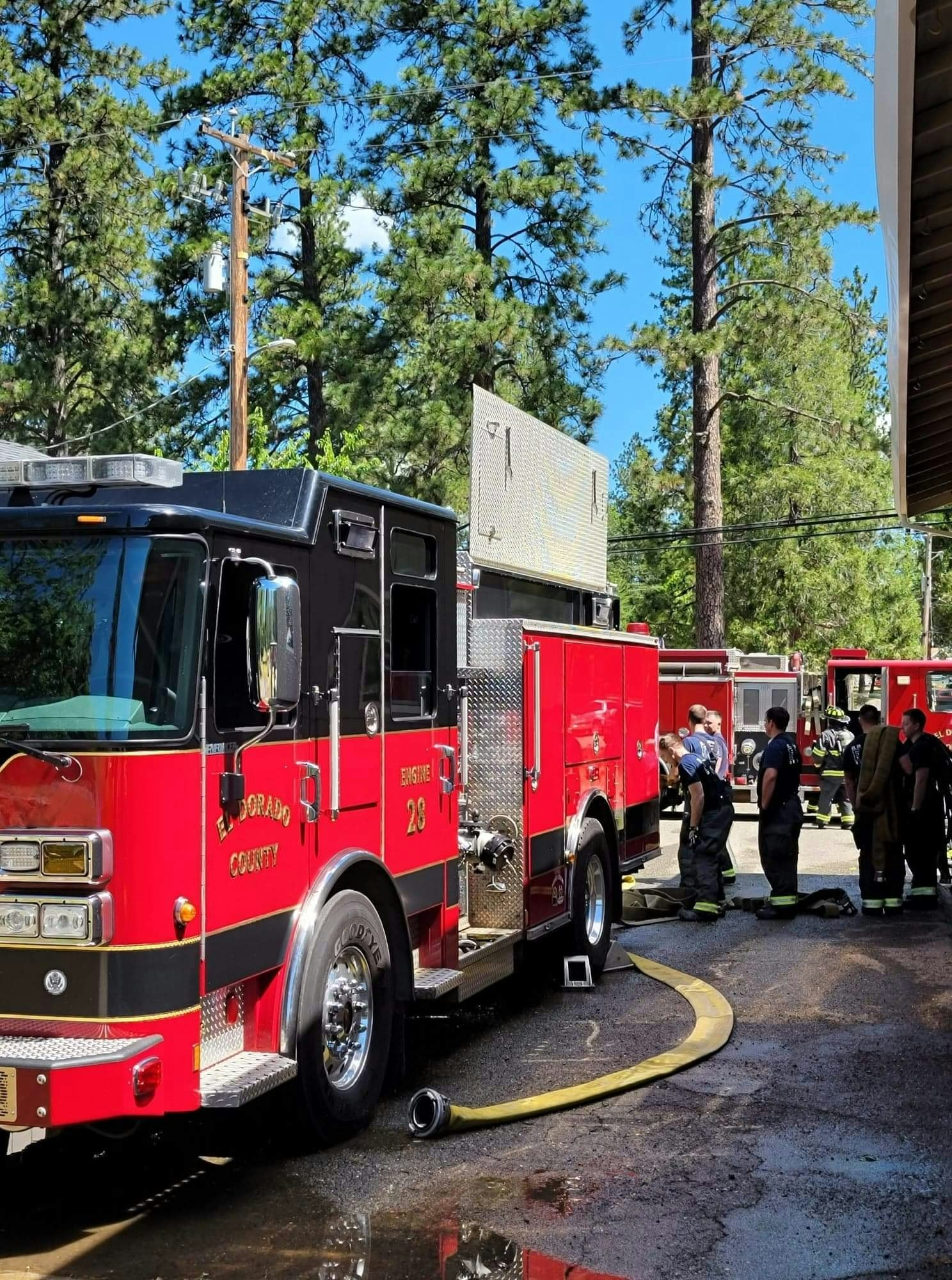 May contain: person, human, fire truck, truck, vehicle, and transportation