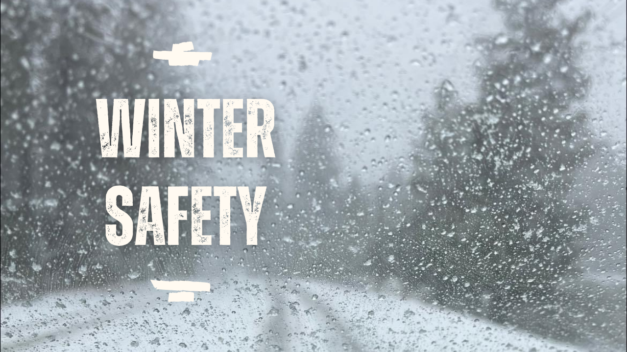 A wintry view through a window with the text "WINTER SAFETY" displayed prominently.