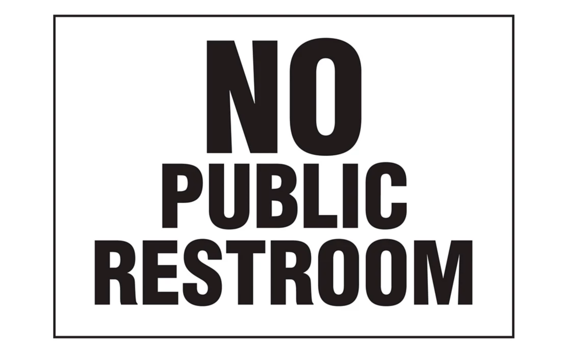 A sign with the text "NO PUBLIC RESTROOM" in bold letters.