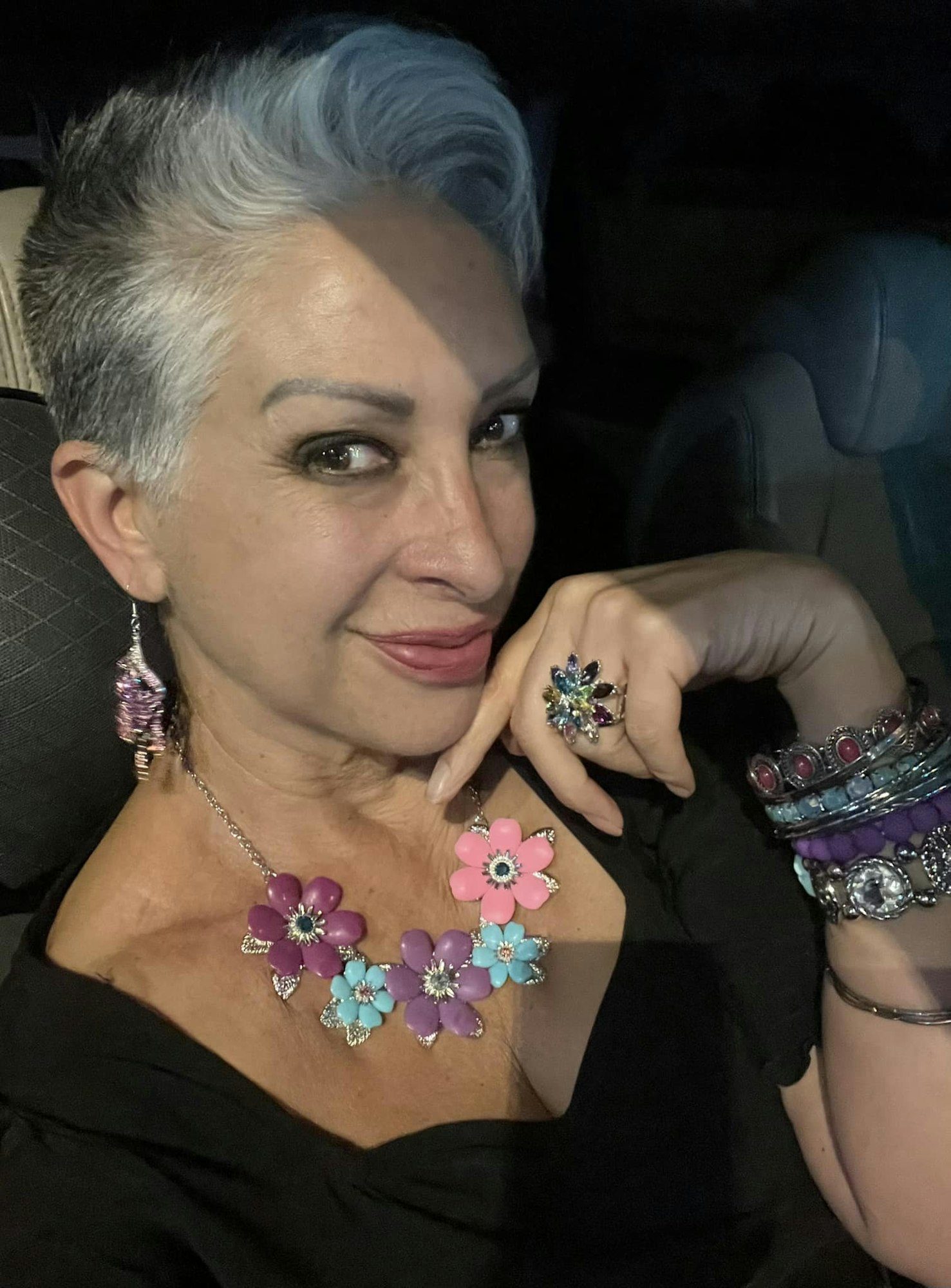 May contain: accessories, jewelry, necklace, earring, bracelet, face, head, person, photography, and portrait