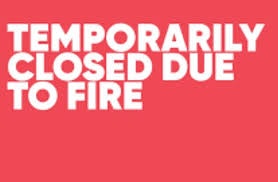 Text on a red background: "TEMPORARILY CLOSED DUE TO FIRE."