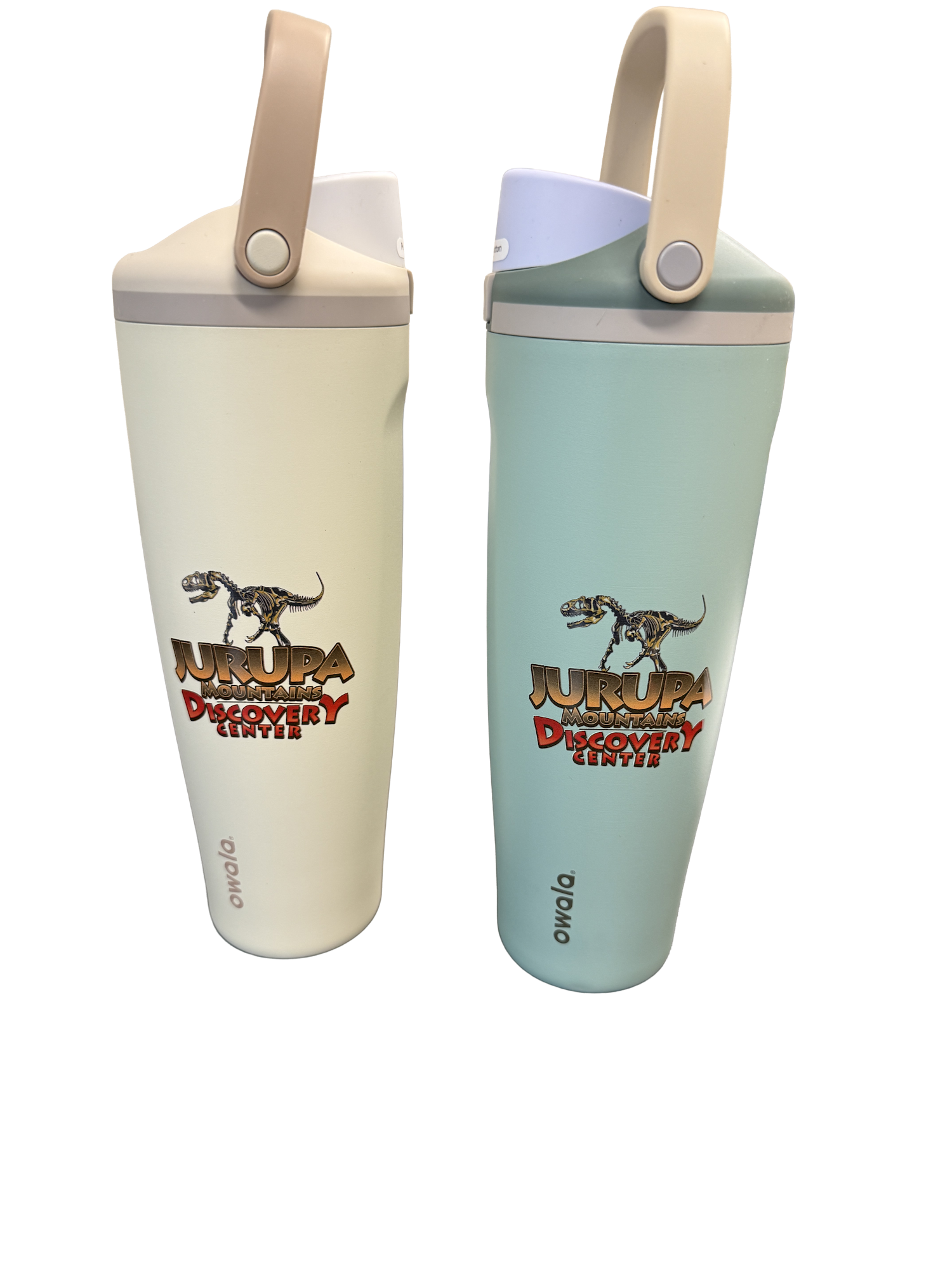 Two stylish water bottles with the logo of Jurupa Mountains Discovery Center and dinosaur designs, in light colors.