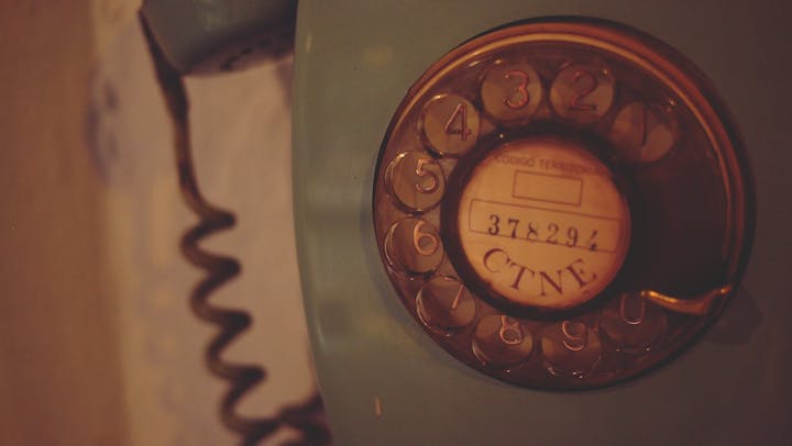 May contain: phone, electronics, dial telephone, and wristwatch