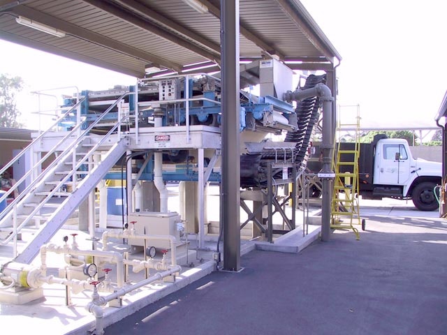 May contain: building, transportation, vehicle, truck, and factory