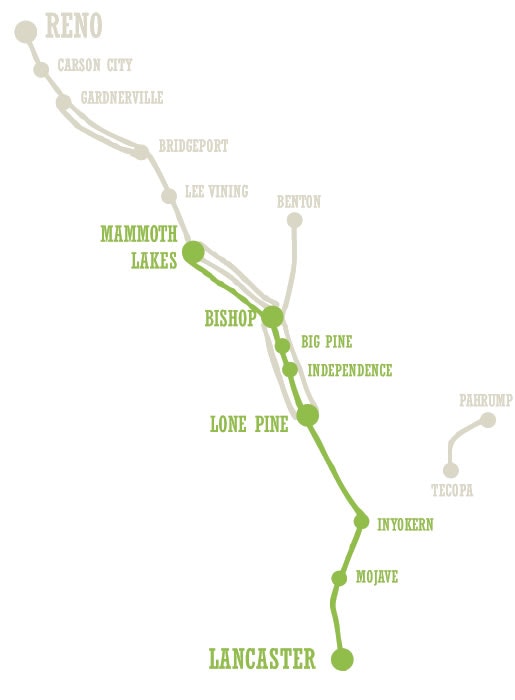 A stylized map showing a route with city names like Reno, Mammoth Lakes, Bishop, and Lancaster.