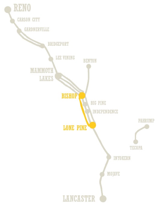 A stylized map highlighting a route or area with place names such as Reno, Bishop, and Lone Pine.